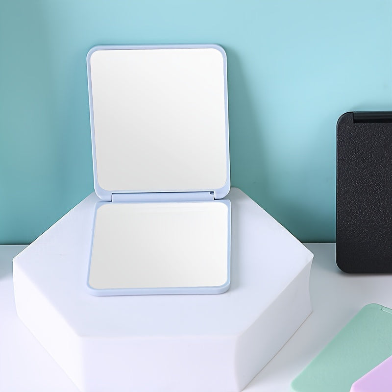 Ultra-Thin Double-Sided Portable Mini Makeup Mirror – Foldable Compact Travel Mirror in Pastel Colors with Modern Geometric Frame