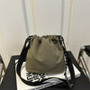 Lightweight Nylon Crossbody Bucket Bag – Large Capacity Drawstring Shoulder Bag with Pendant Charm, Sporty Casual
