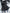 AFTF BASIC Women's Mid-Length Plush-Lined Jacket with Fur-Trim Collar and Asymmetrical Hem, Machine Washable All-Season Black Coat