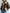 Women's Faux Leather Jacket with Fluffy Collar, Long Zip-Up Coat with Pockets — Brown All-Season Casual Chic