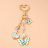 Enamel Flower & Butterfly Heart Keychain – Cute Love Key Ring Handbag Charm Pendant for Women & Girls