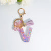 Sequin Letter Keychain with Tassel & Butterfly Charm – Initial A-Z Resin Keyring for Women, Bag & Car (55mm / 2.2 in)