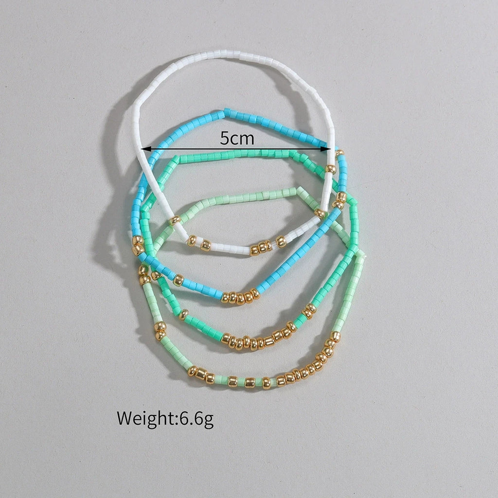 Boho Seed Bead Stretch Bracelet Set - 4-Pack Gold Elastic Bangles for Women, Handmade Geometric Summer Jewelry