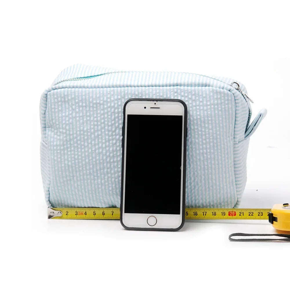 Seersucker Ruffle Makeup Bag — Pink & Purple Striped Zipper Pouch for Travel & Toiletries