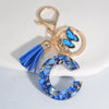 Blue Glazed Stone A to Z Initial Keychain with Butterfly Tassel – 55mm (2.17 in) Resin Alphabet Charm for Women, Car & Bag