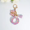 Sequin Letter Keychain with Tassel & Butterfly Charm – Initial A-Z Resin Keyring for Women, Bag & Car (55mm / 2.2 in)