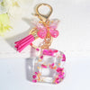 Pink Dried Flower Resin Initial Keychain with Butterfly Tassel A-Z Letter Keyring for Women Valentine's Gift