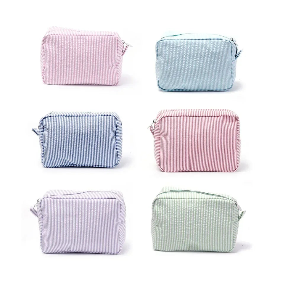 Seersucker Ruffle Makeup Bag — Pink & Purple Striped Zipper Pouch for Travel & Toiletries