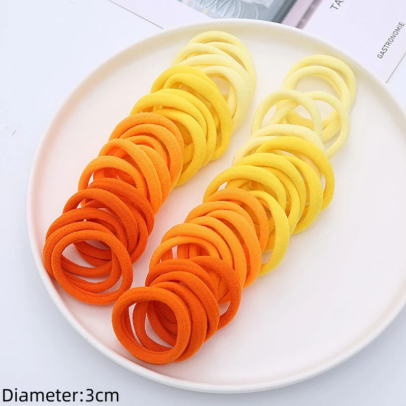 50-Pack No-Damage Elastic Hair Ties for Women & Girls – Seamless Ponytail Holders (Assorted Colors, Includes Black)