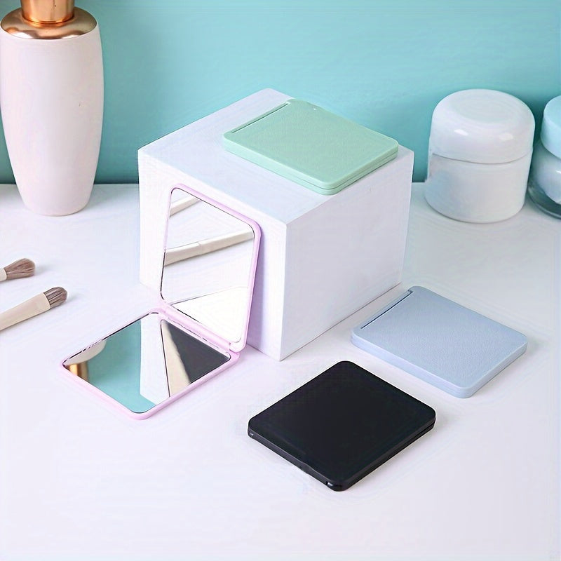 Ultra-Thin Double-Sided Portable Mini Makeup Mirror – Foldable Compact Travel Mirror in Pastel Colors with Modern Geometric Frame