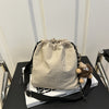 Lightweight Nylon Crossbody Bucket Bag – Large Capacity Drawstring Shoulder Bag with Pendant Charm, Sporty Casual