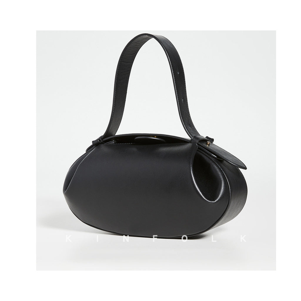 Women's Vintage Round Crossbody Bag – Small Faux Leather Baguette Purse with Buckle Closure (Black, Burgundy)