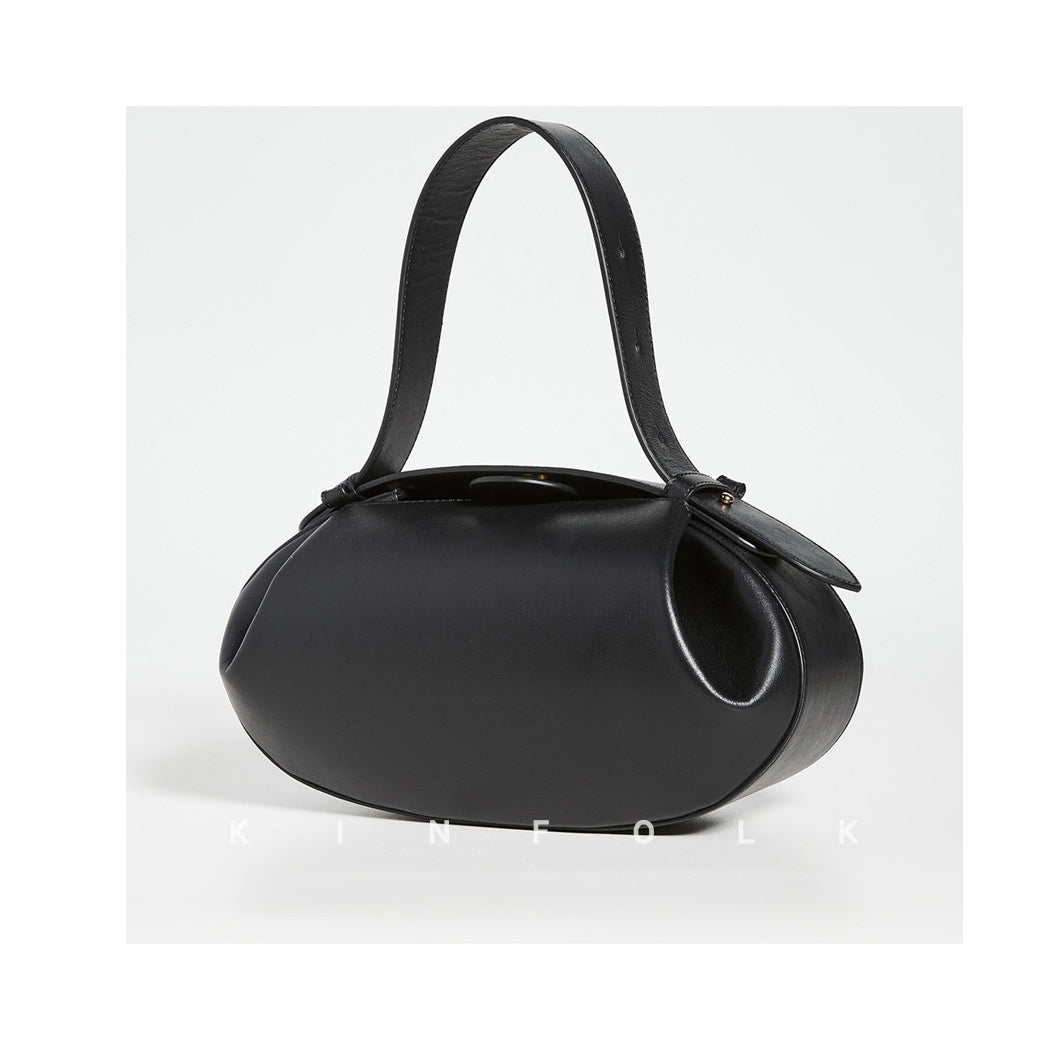 Women's Vintage Round Crossbody Bag – Small Faux Leather Baguette Purse with Buckle Closure (Black, Burgundy)